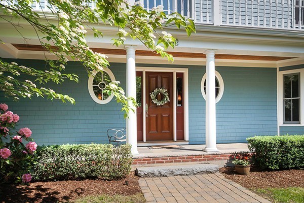 82 Middle Street Lexington, MA 02421 - Photo 2 of 27 a front view of a house with a garden
