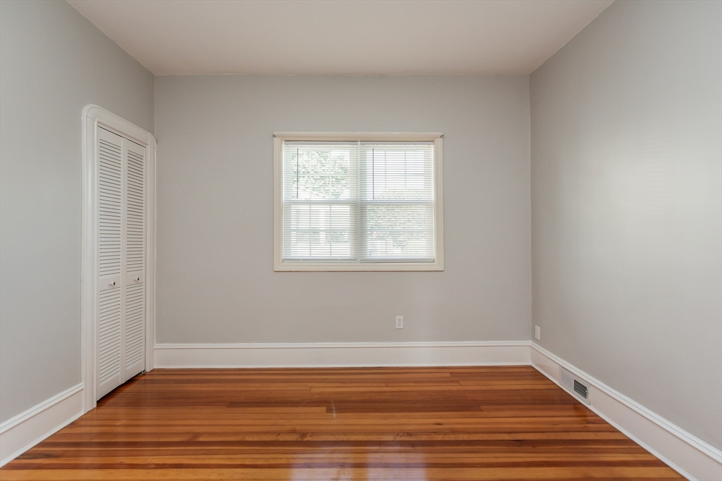 2714 Riverside Avenue Somerset, MA 02726 - Photo 15 of 36 a view of a room with wooden floor and windows in it
