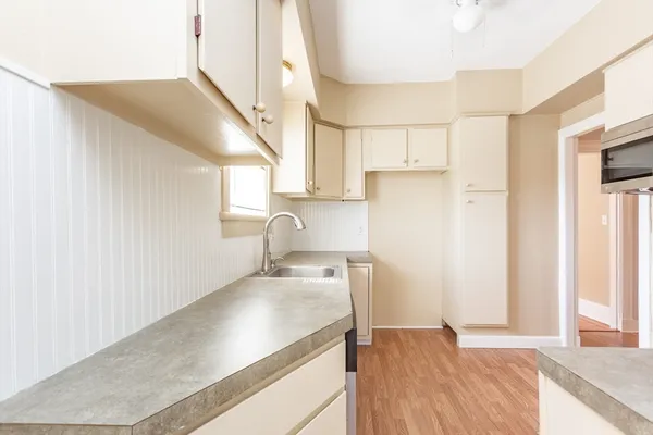 a view of a kitchen cabinets a sink and dishwasher
