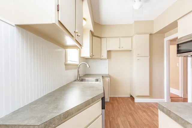 a view of a kitchen cabinets a sink and dishwasher
