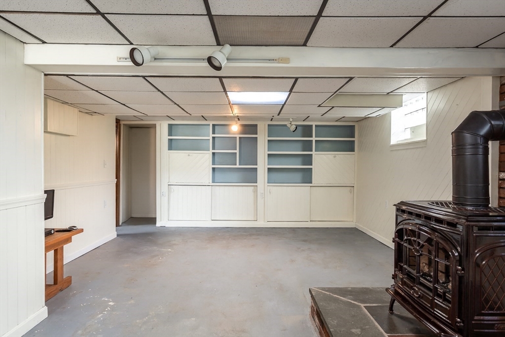 2714 Riverside Avenue Somerset, MA 02726 - Photo 29 of 36 a view of an empty room with a fireplace