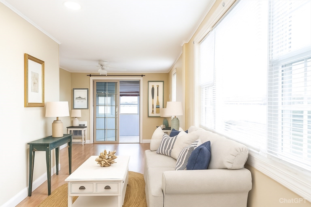 2714 Riverside Avenue Somerset, MA 02726 - Photo 34 of 36 a living room with furniture and a large window