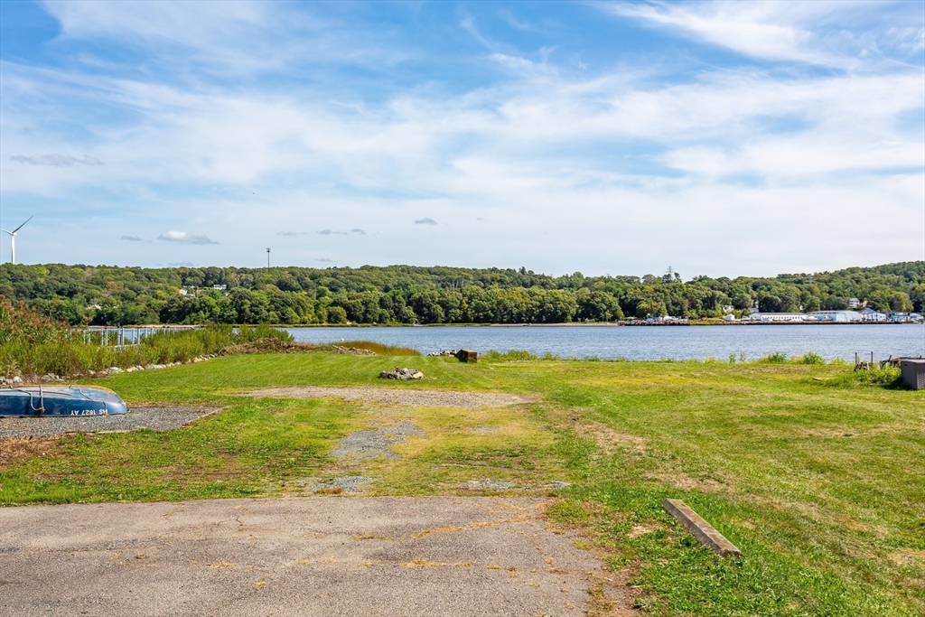2714 Riverside Avenue Somerset, MA 02726 - Photo 6 of 36 a view of an swimming pool and an outdoor seating