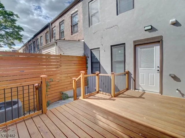 a view of a house with wooden floor