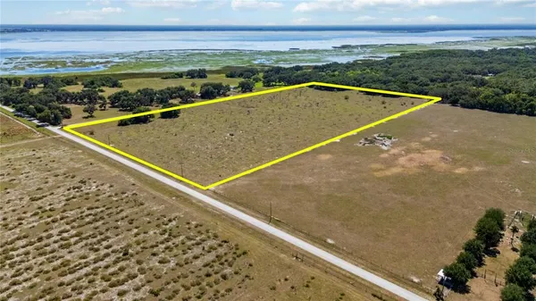 a view of swimming pool with a balcony