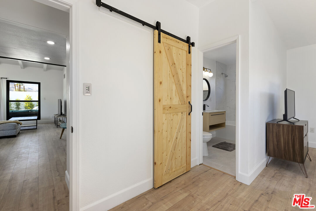 Undisclosed Address Palm Desert, CA 92260 - Photo 12 of 24 a view of a bathroom with a tub and shower