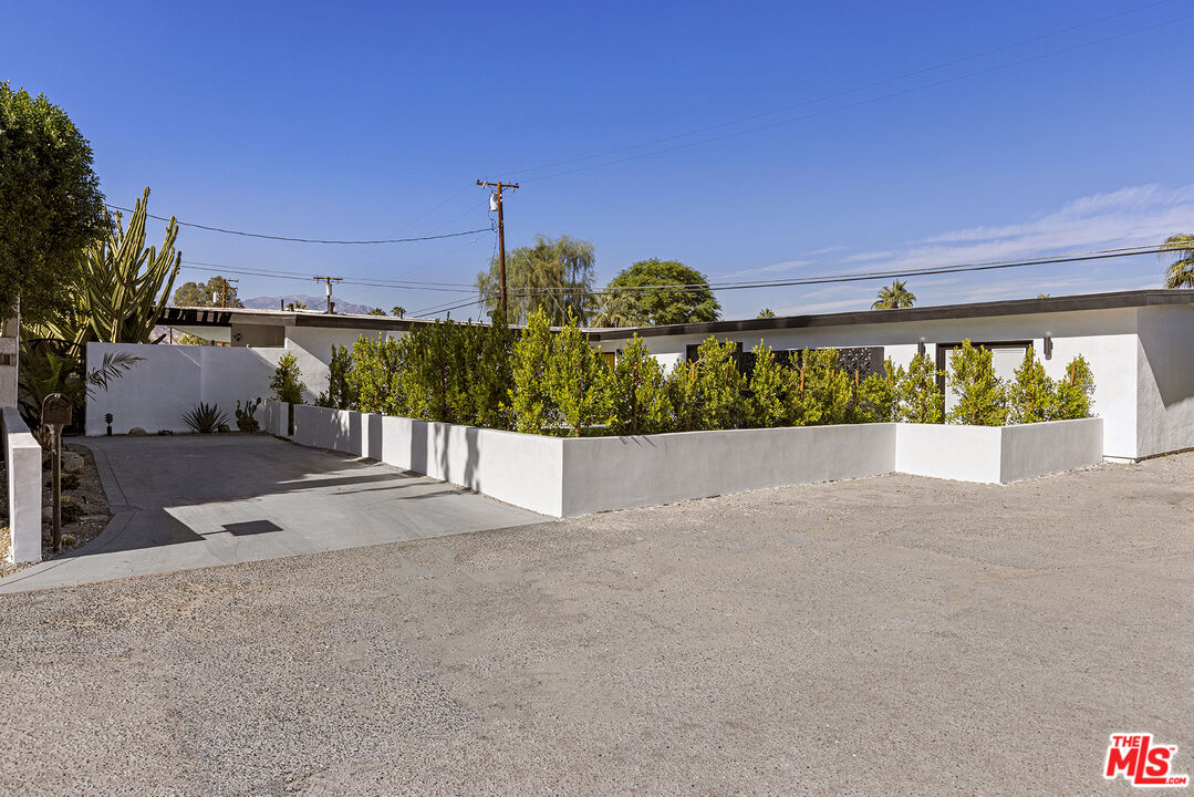 Undisclosed Address Palm Desert, CA 92260 - Photo 24 of 24 a view of a street with a building in the background