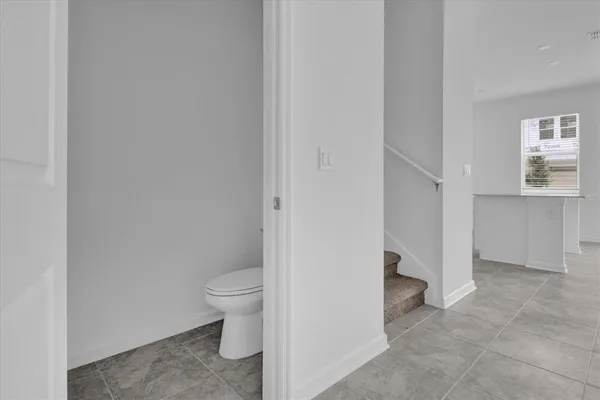 a view of a bathroom with a toilet