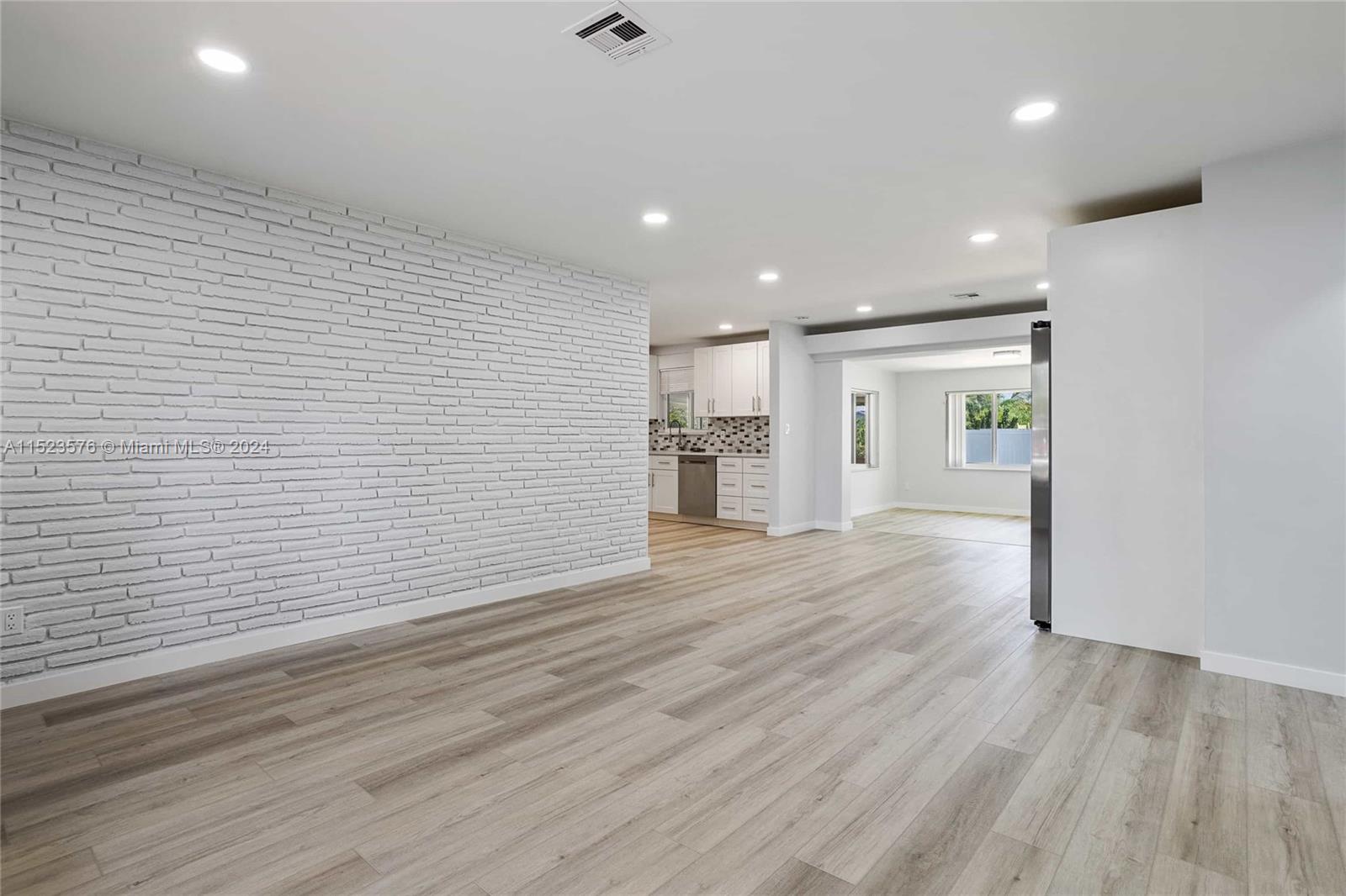 3329 Arthur Street Hollywood, FL 33021 - Photo 2 of 25 a view of empty room with wooden floor