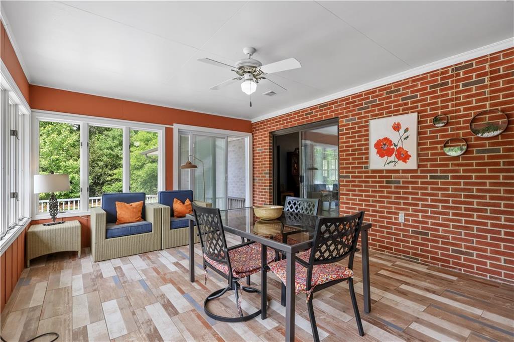 4012 Morris Road Powder Springs, GA 30127 - Photo 22 of 64 a living room with furniture and floor to ceiling windows