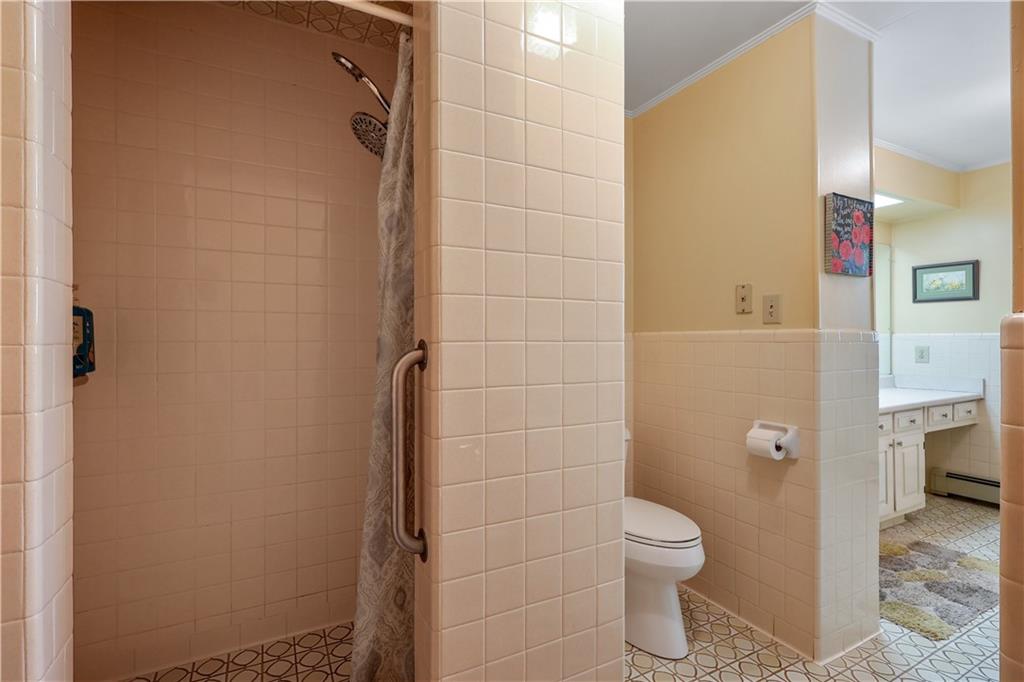 4012 Morris Road Powder Springs, GA 30127 - Photo 27 of 64 a bathroom with a toilet and a shower