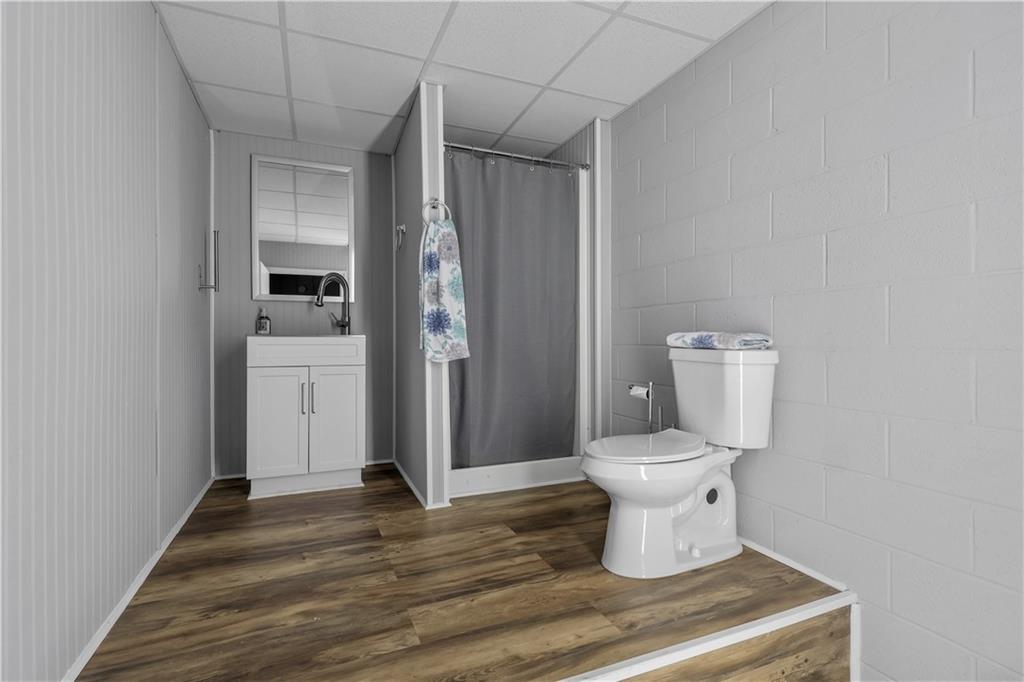 4012 Morris Road Powder Springs, GA 30127 - Photo 36 of 64 a bathroom with a toilet and a shower