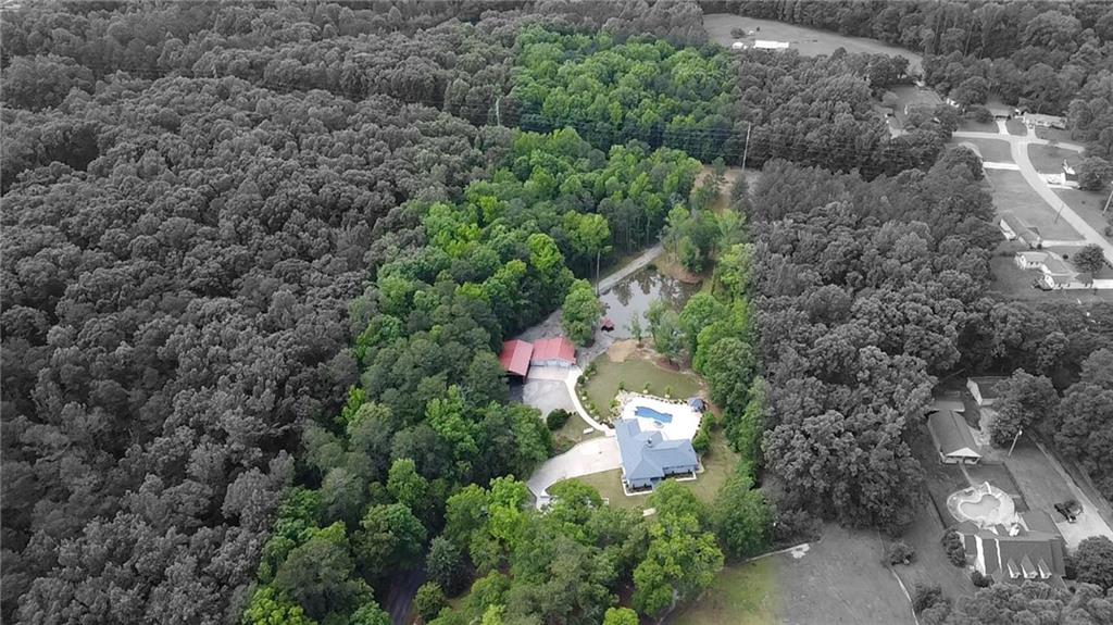 4012 Morris Road Powder Springs, GA 30127 - Photo 60 of 64 an aerial view of a house with a yard