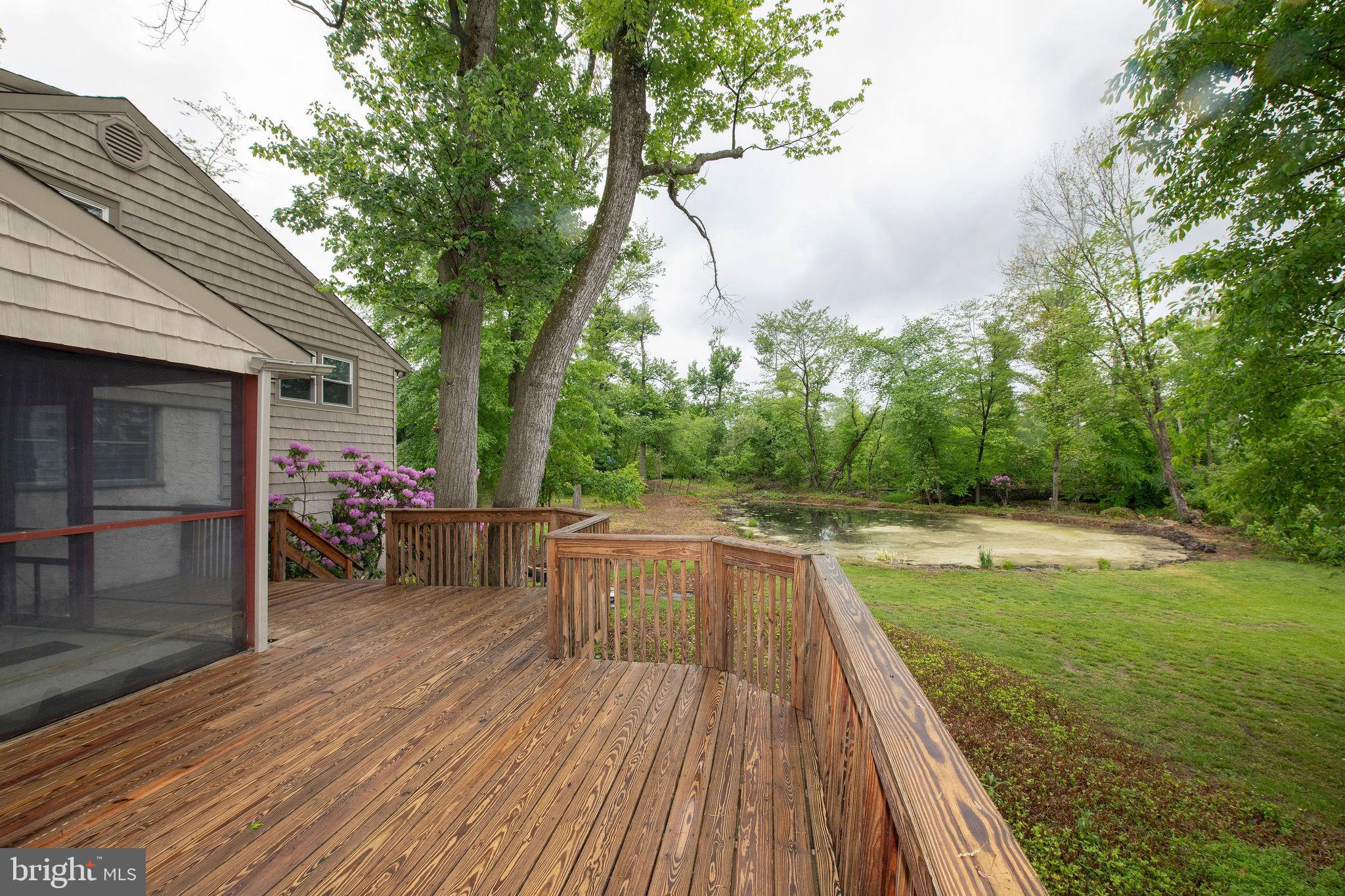 927 Herman Road Horsham, PA 19044 - Photo 12 of 50 side deck overlooking pond