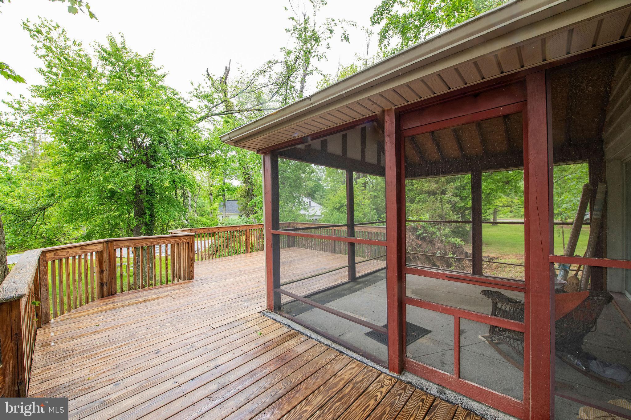 927 Herman Road Horsham, PA 19044 - Photo 14 of 50 deck & enclosed porch off dining room