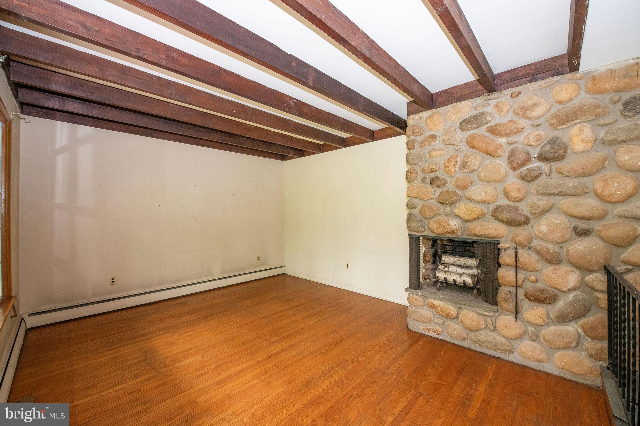 927 Herman Road Horsham, PA 19044 - Photo 21 of 50 Living room with wood burning fireplace