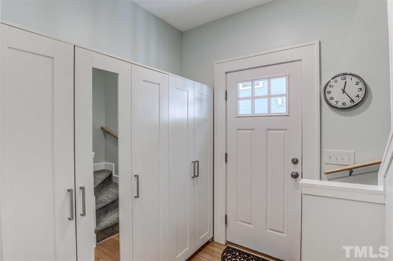 521 Mial Street Raleigh, NC 27608 - Photo 22 of 30 a view of entryway with wooden floor
