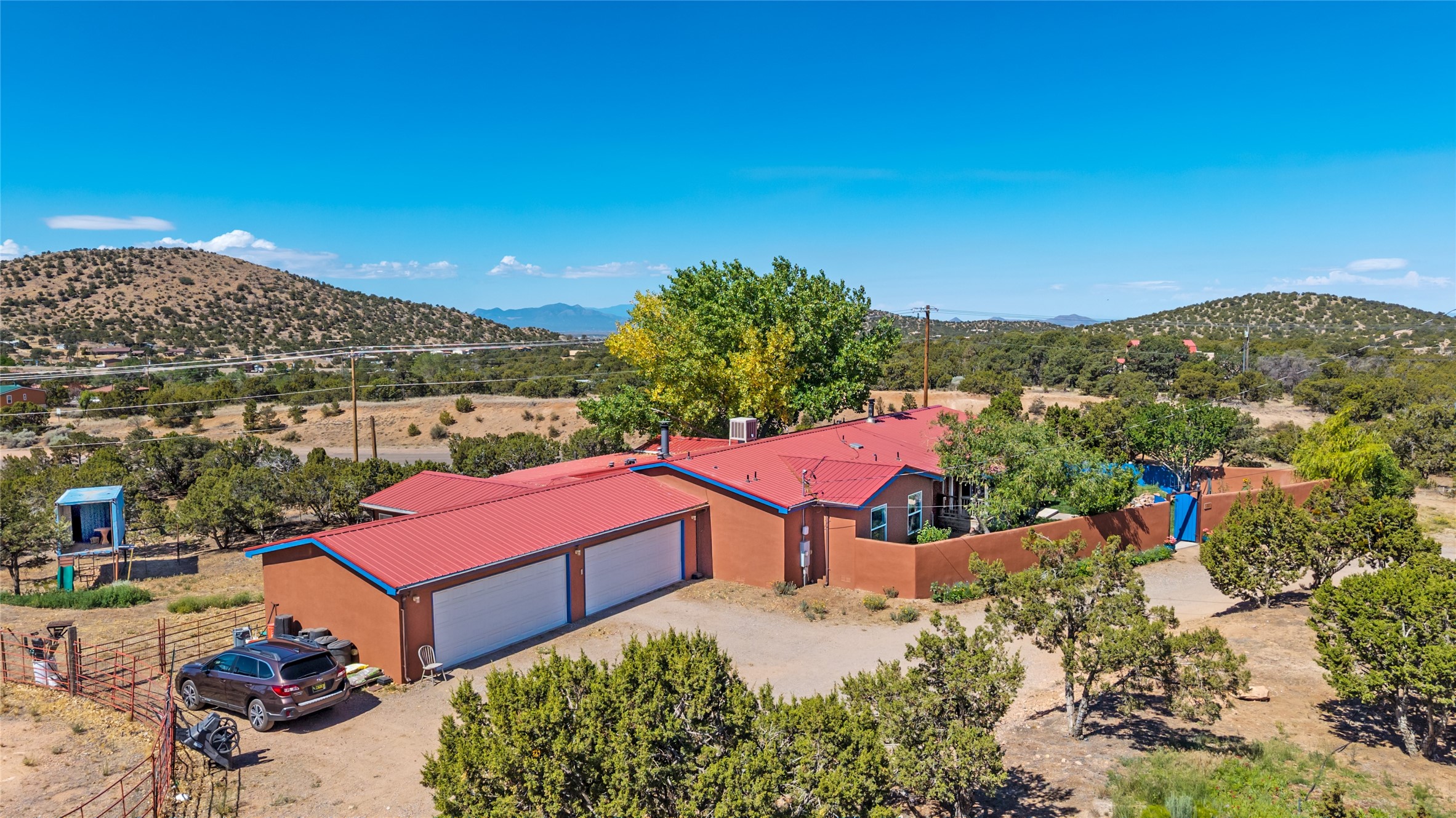 12 Apache Ridge Road Santa Fe, NM 87505 - Photo 1 of 69 front of home via drone