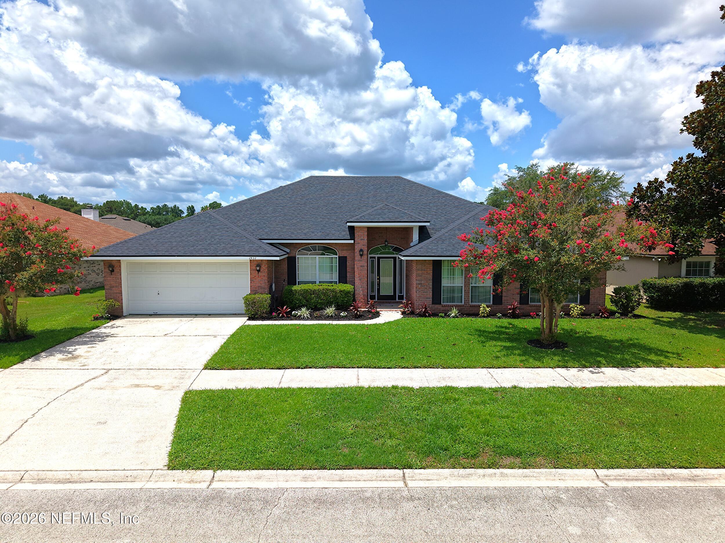2432 Mallory Hills Road Jacksonville, FL 32221 - Photo 58 of 68 78_aerial front facade 2
