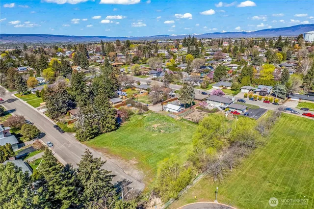 a view of a city with an ocean