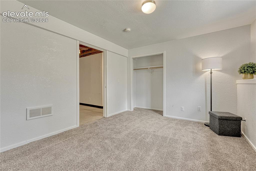 7285 Julynn Road Colorado Springs, CO 80919 - Photo 32 of 45 a view of an empty room
