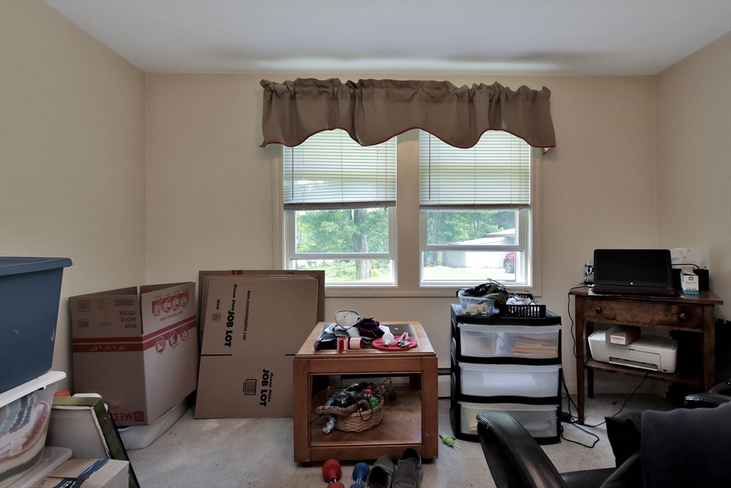 438 Boston Post Road Amherst, NH 03031 - Photo 20 of 32 a bedroom with a bed and a window