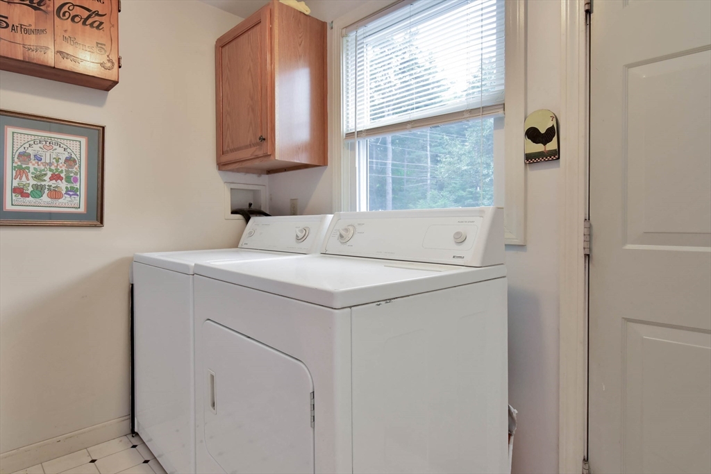 438 Boston Post Road Amherst, NH 03031 - Photo 25 of 32 a utility room with dryer and washer