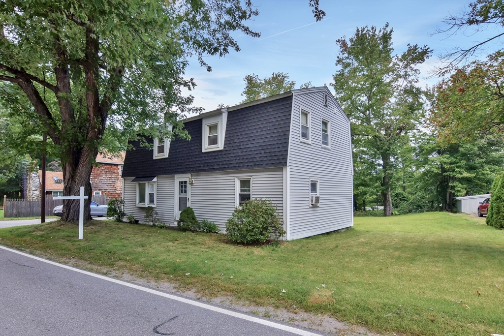 438 Boston Post Road Amherst, NH 03031 - Photo 3 of 32 a view of a house with a yard
