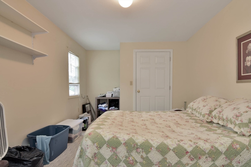 438 Boston Post Road Amherst, NH 03031 - Photo 32 of 32 a bedroom with a bed and a window
