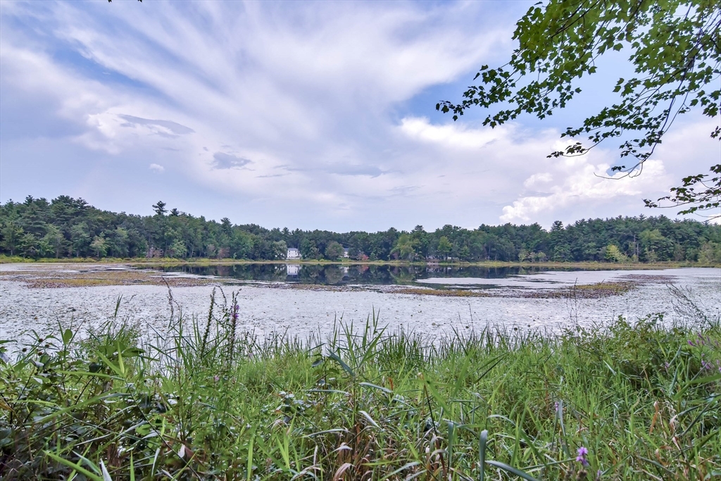 438 Boston Post Road Amherst, NH 03031 - Photo 10 of 32 a view of lake with green space