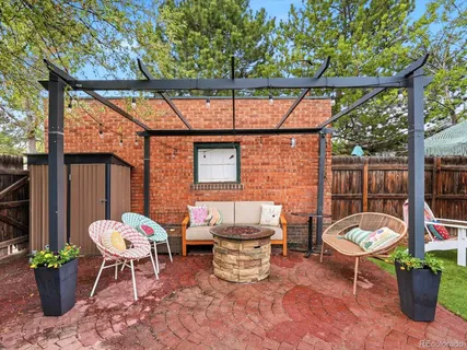 a outdoor living space with furniture and garden view