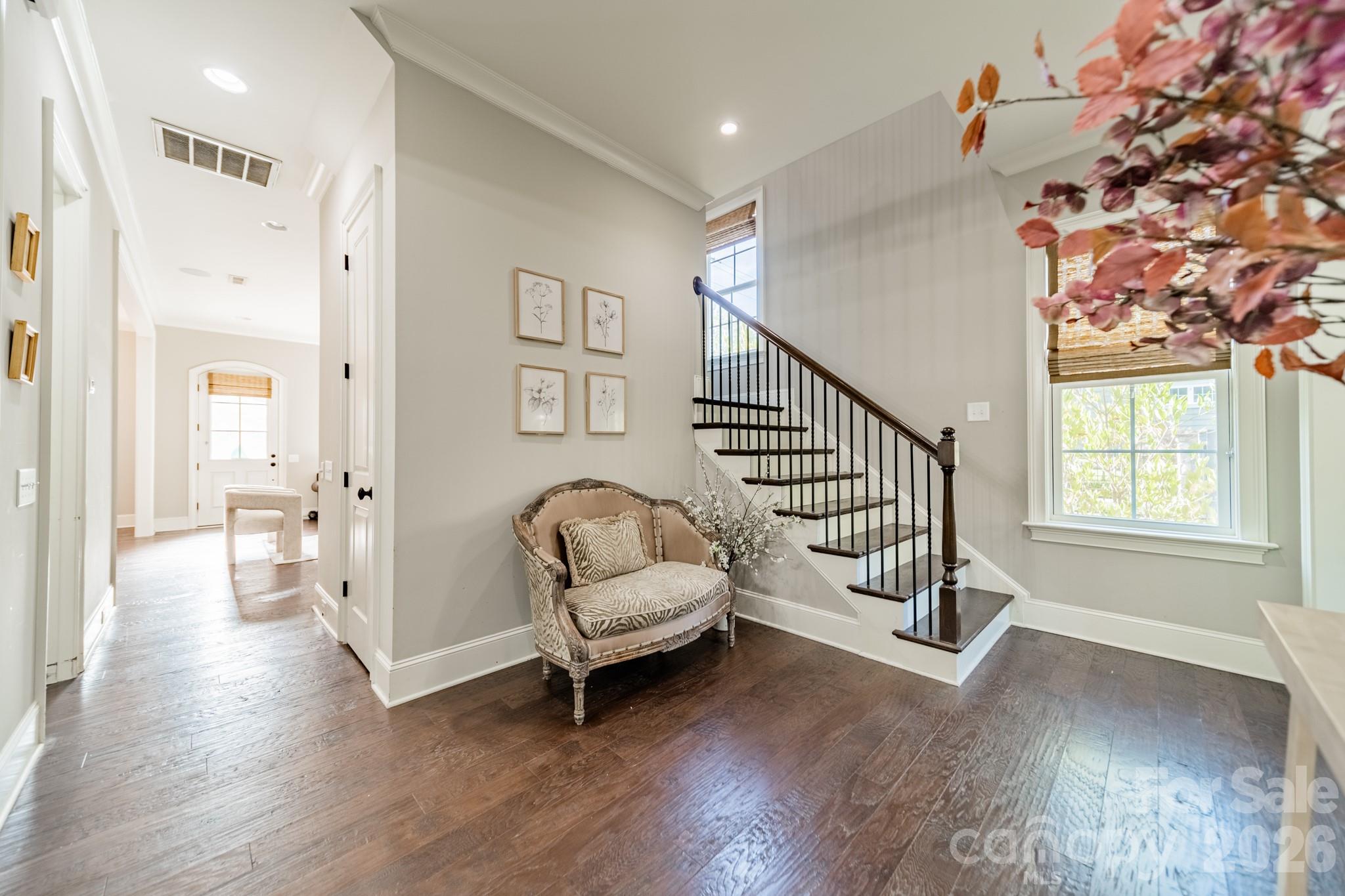 131 Boyce Road Charlotte, NC 28211 - Photo 11 of 48 a living room with furniture and a wooden floor