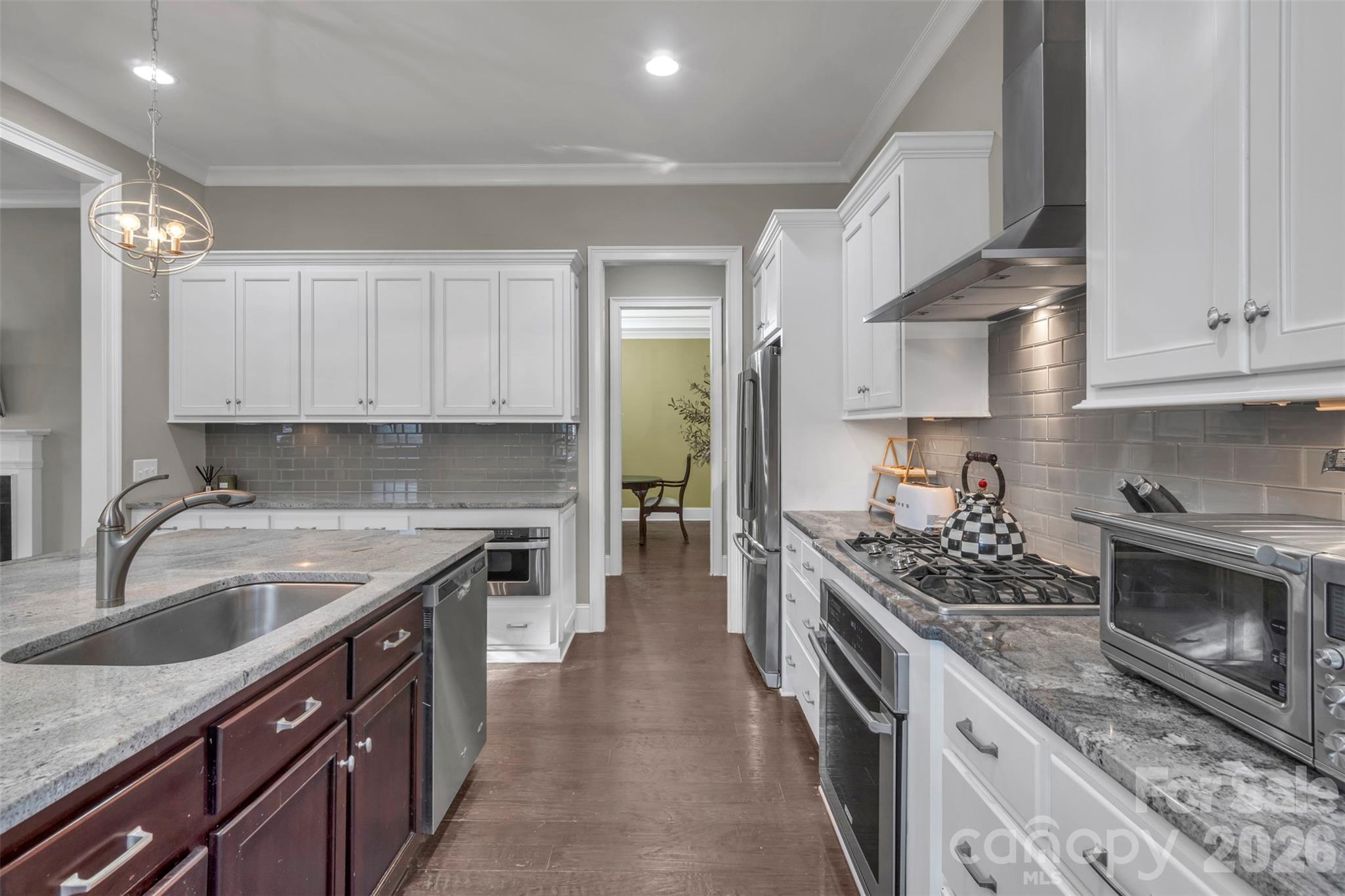 131 Boyce Road Charlotte, NC 28211 - Photo 20 of 48 a kitchen with stainless steel appliances granite countertop a sink stove and cabinets