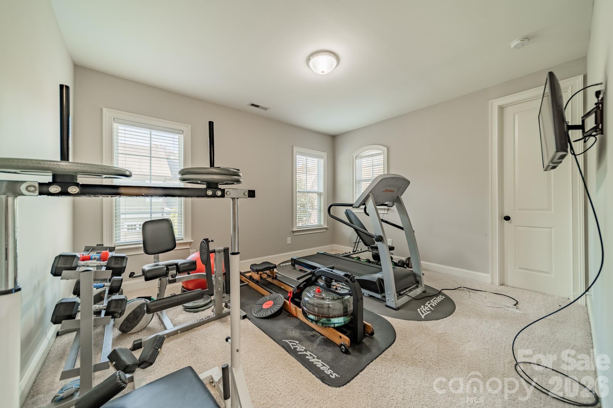 131 Boyce Road Charlotte, NC 28211 - Photo 28 of 48 a view of a room with gym equipment