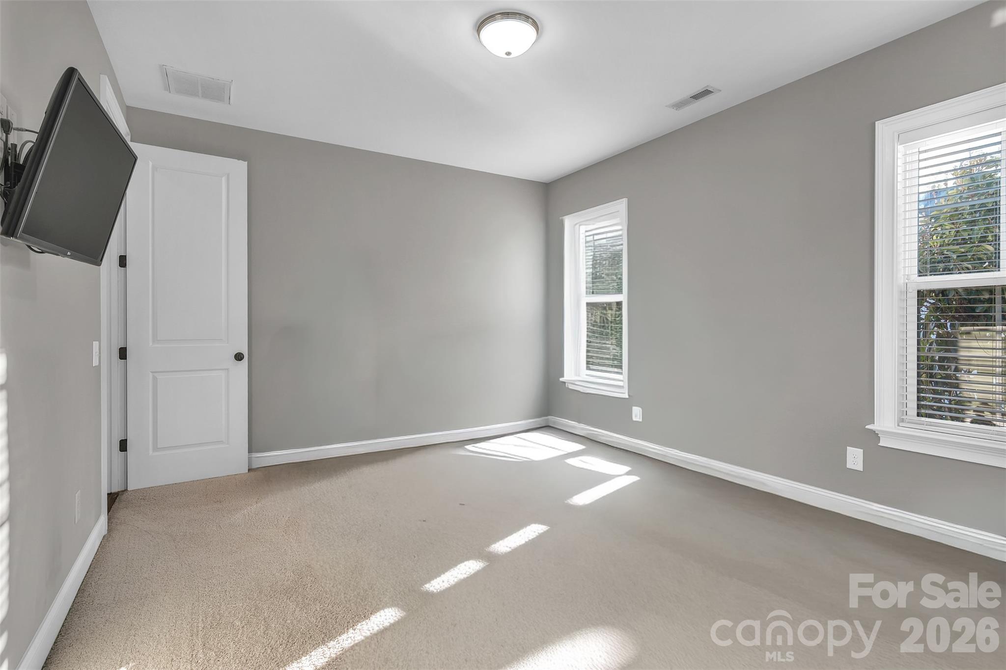 131 Boyce Road Charlotte, NC 28211 - Photo 30 of 48 an empty room with windows