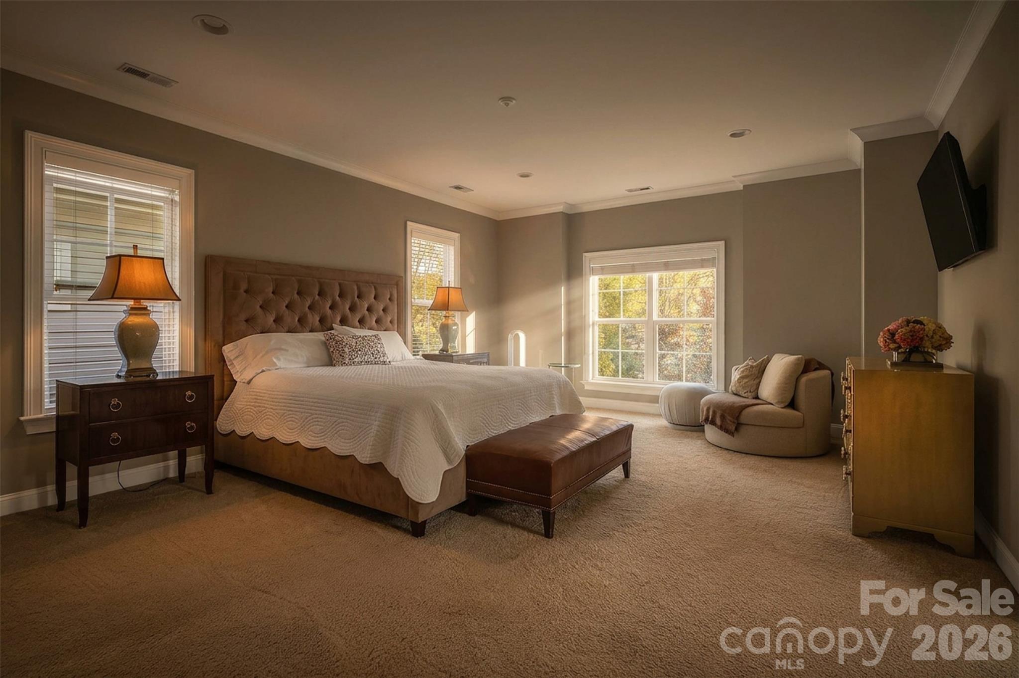 131 Boyce Road Charlotte, NC 28211 - Photo 38 of 48 a bedroom with a bed and glass window
