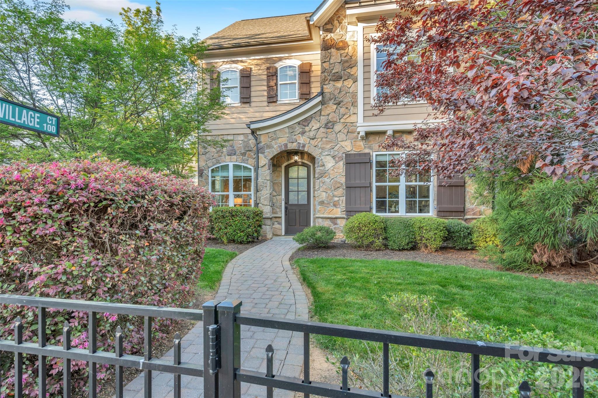 131 Boyce Road Charlotte, NC 28211 - Photo 5 of 48 a front view of a house with a yard