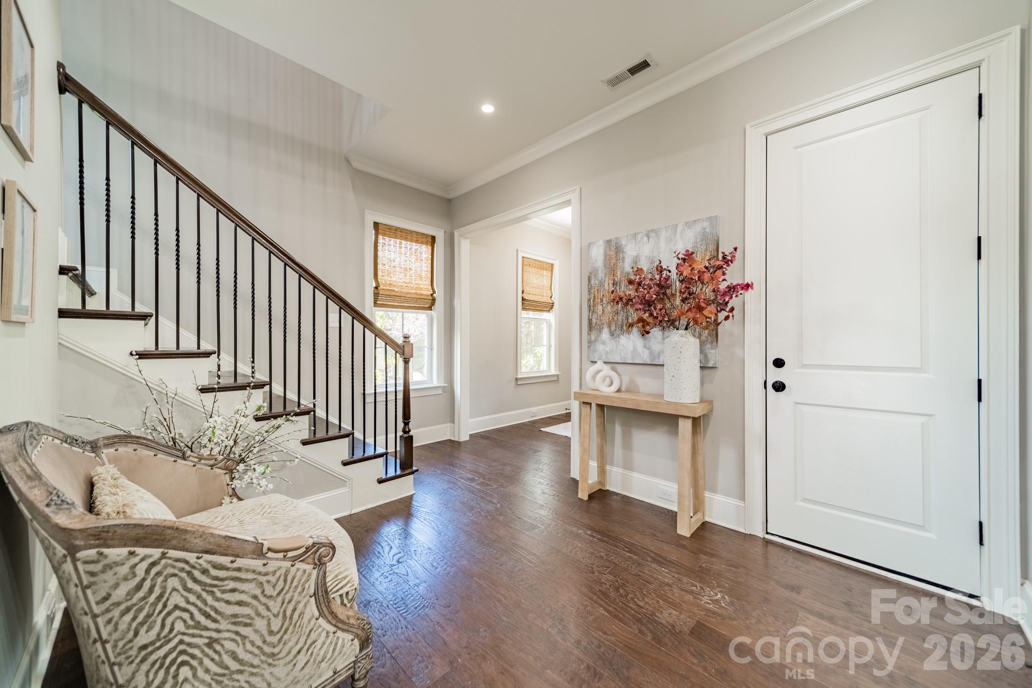 131 Boyce Road Charlotte, NC 28211 - Photo 10 of 48 a view of an entryway with wooden floor