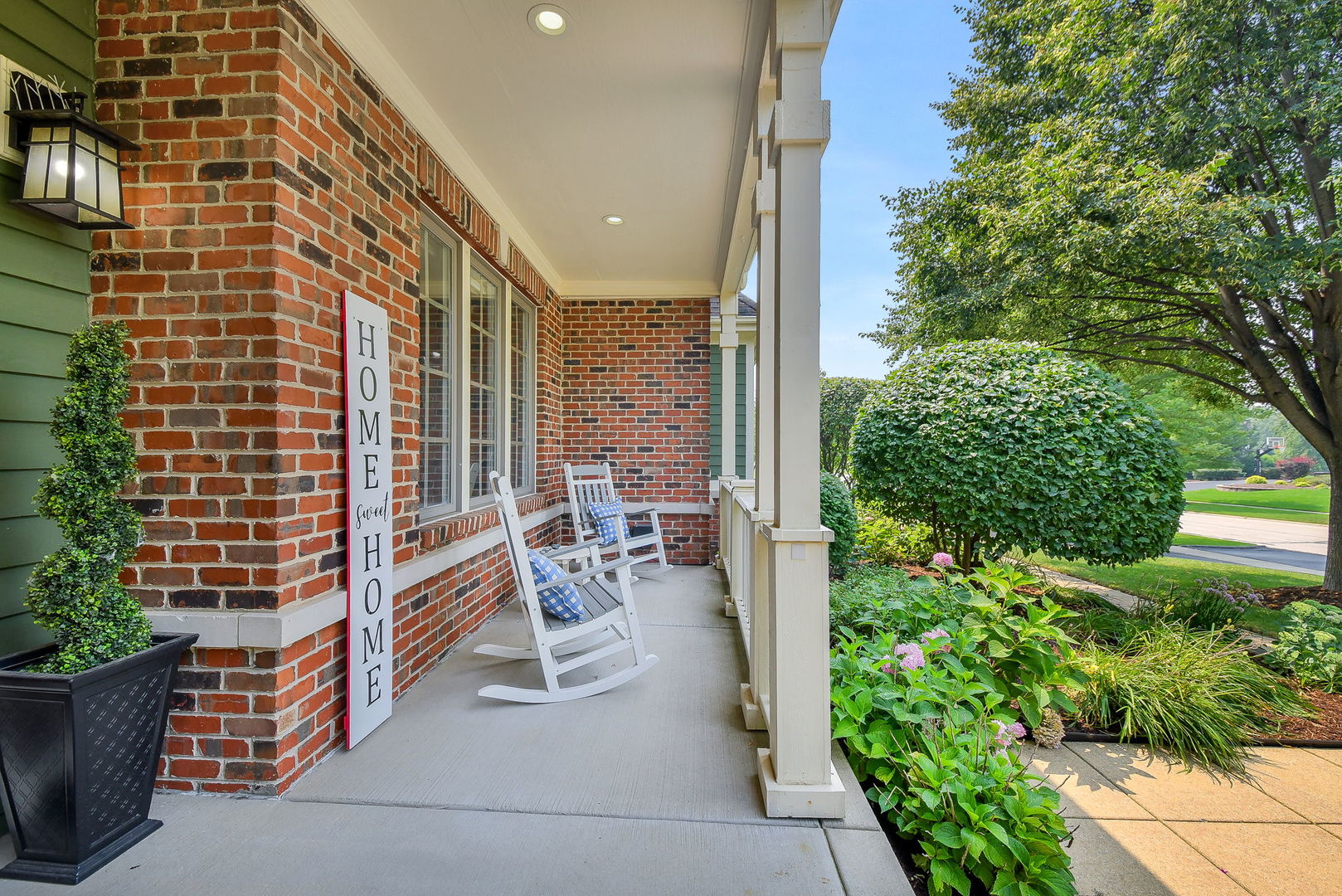 3N943 Walt Whitman Road St. Charles, IL 60175 - Photo 3 of 44 a balcony with chairs and with potted plants