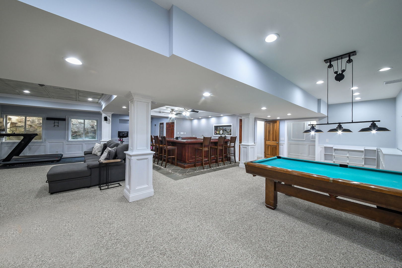 3N943 Walt Whitman Road St. Charles, IL 60175 - Photo 36 of 43 a lobby with furniture and couches with kitchen view