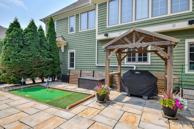 a view of a house with patio