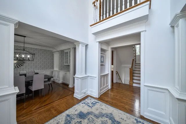 a view of a livingroom with furniture and front door