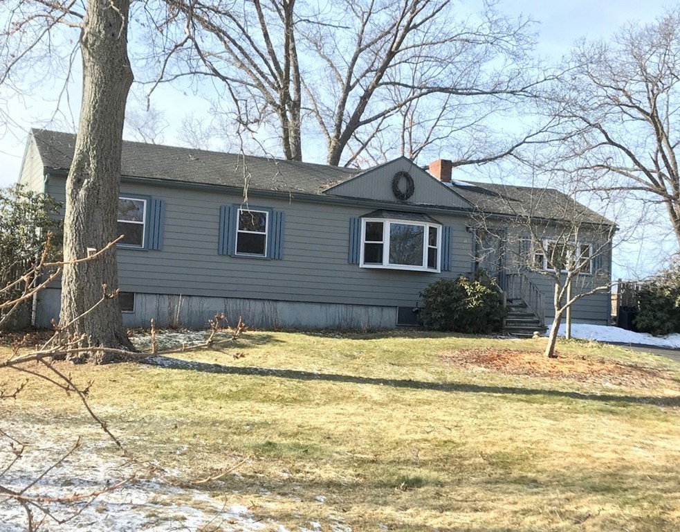 113 Peter Spring Road Concord, MA 01742 - Photo 1 of 13 a house that has a tree in front of it