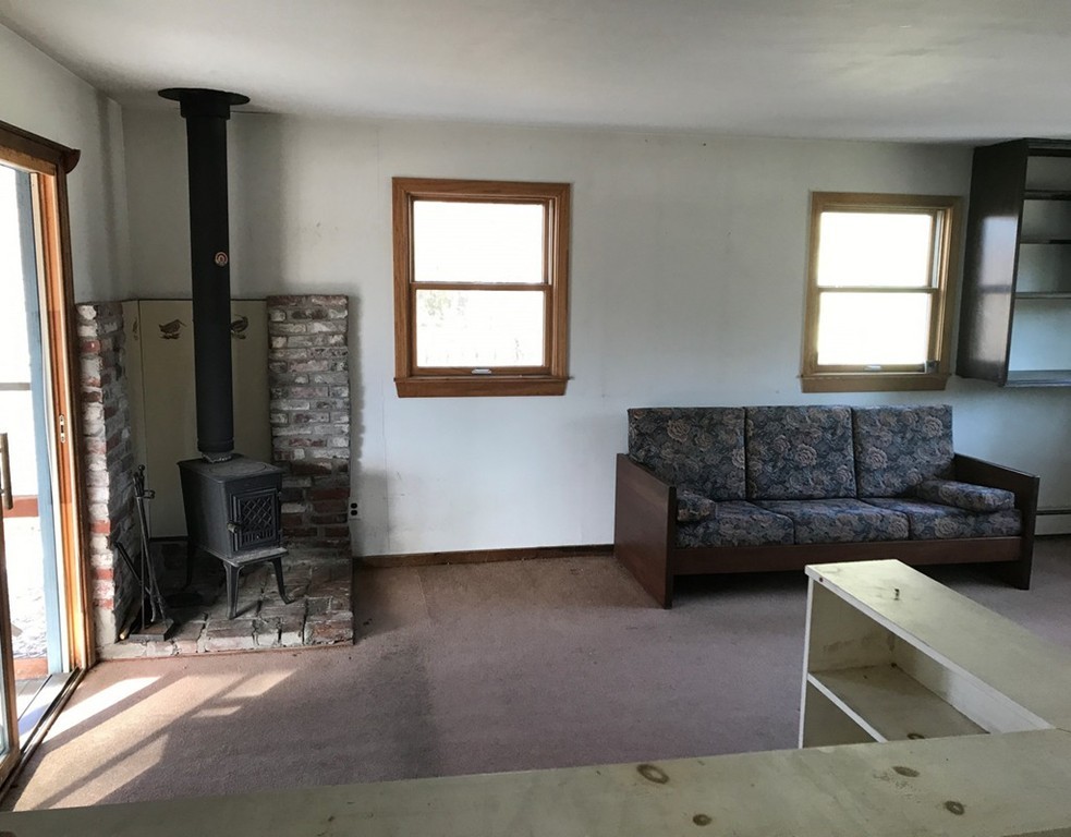 113 Peter Spring Road Concord, MA 01742 - Photo 3 of 13 a living room with furniture and a window