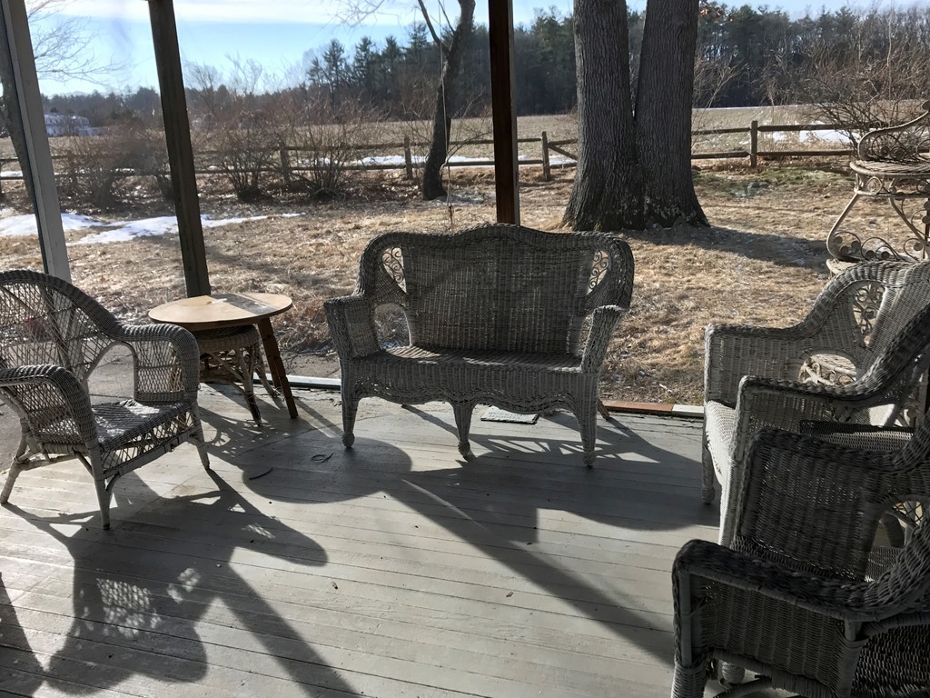 113 Peter Spring Road Concord, MA 01742 - Photo 4 of 13 a view of a chairs and table in the patio