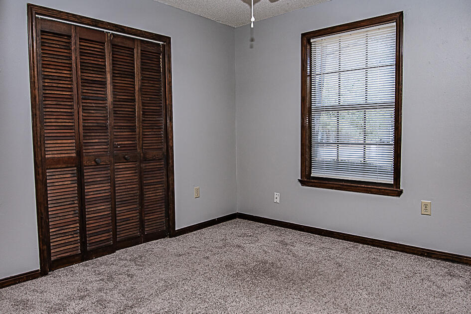 116 Walker Circle West Crestview, FL 32539 - Photo 15 of 20 a view of empty room with windows