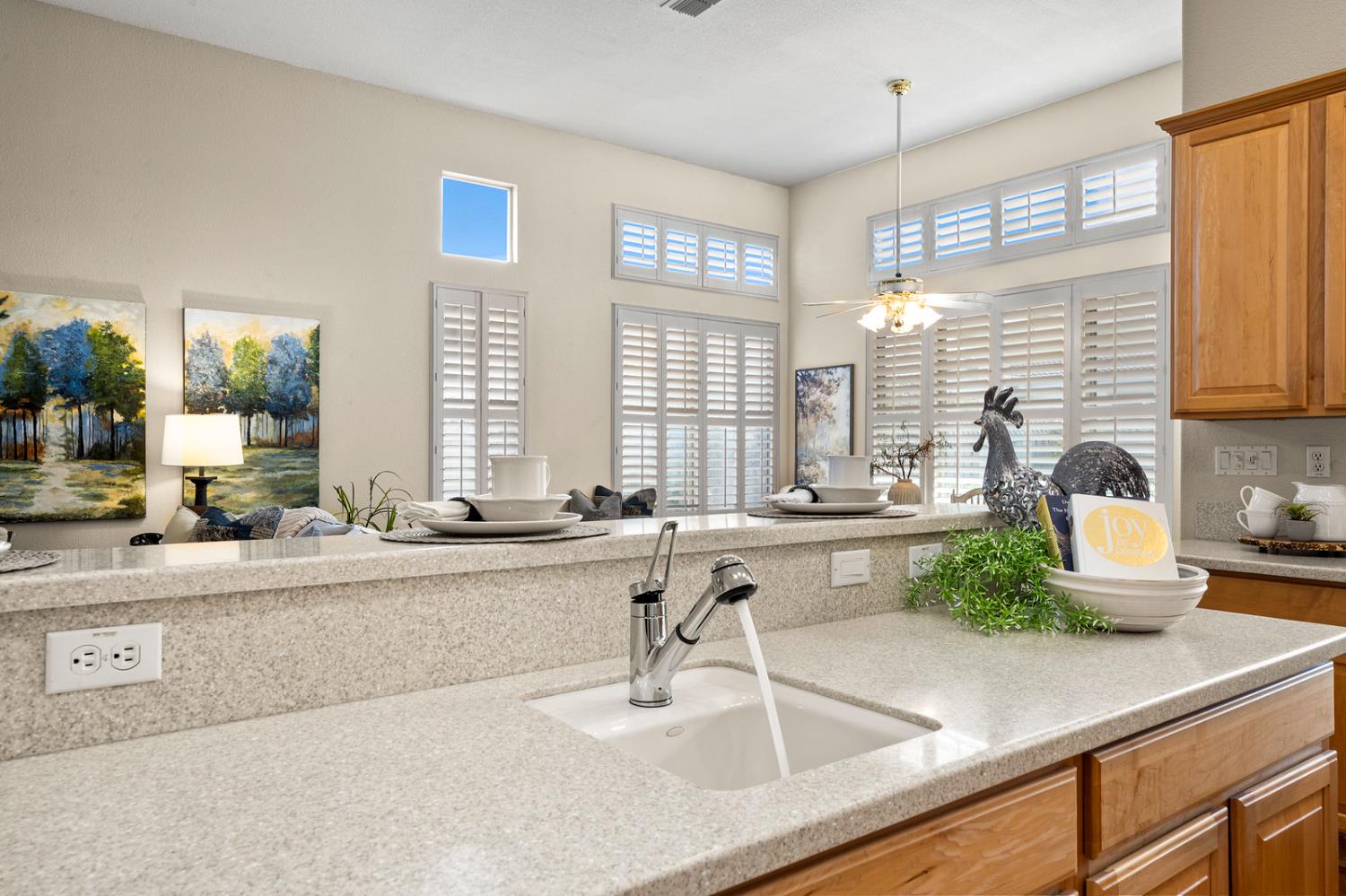 856 Mossy Ridge Lane Lincoln, CA 95648 - Photo 15 of 44 a kitchen with counter top space and large windows