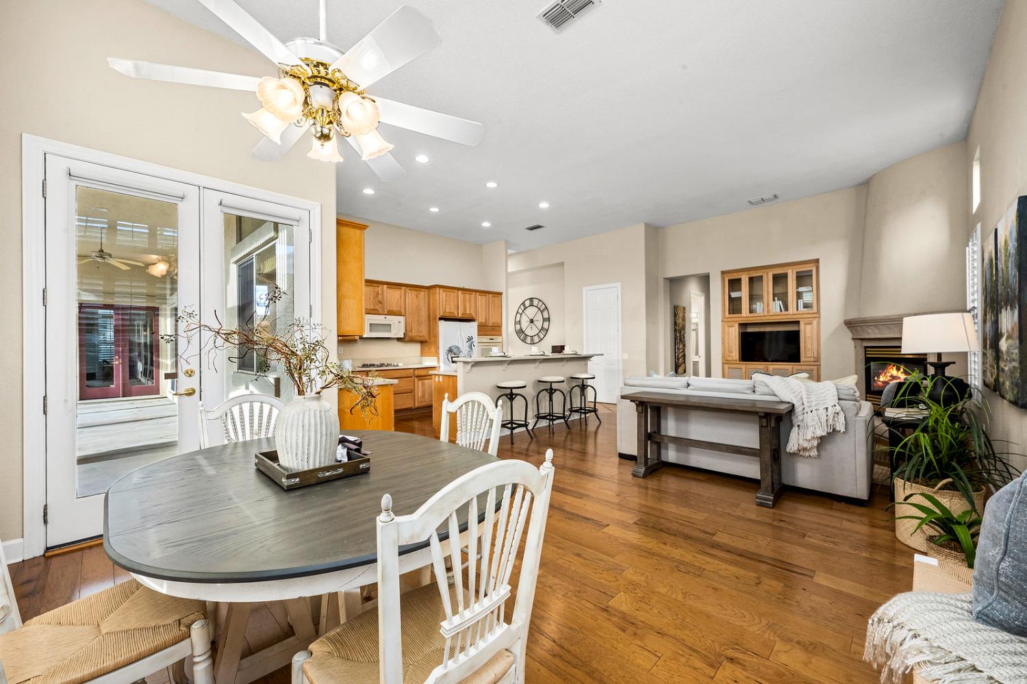 856 Mossy Ridge Lane Lincoln, CA 95648 - Photo 17 of 44 a view of a dining room with furniture and wooden floor