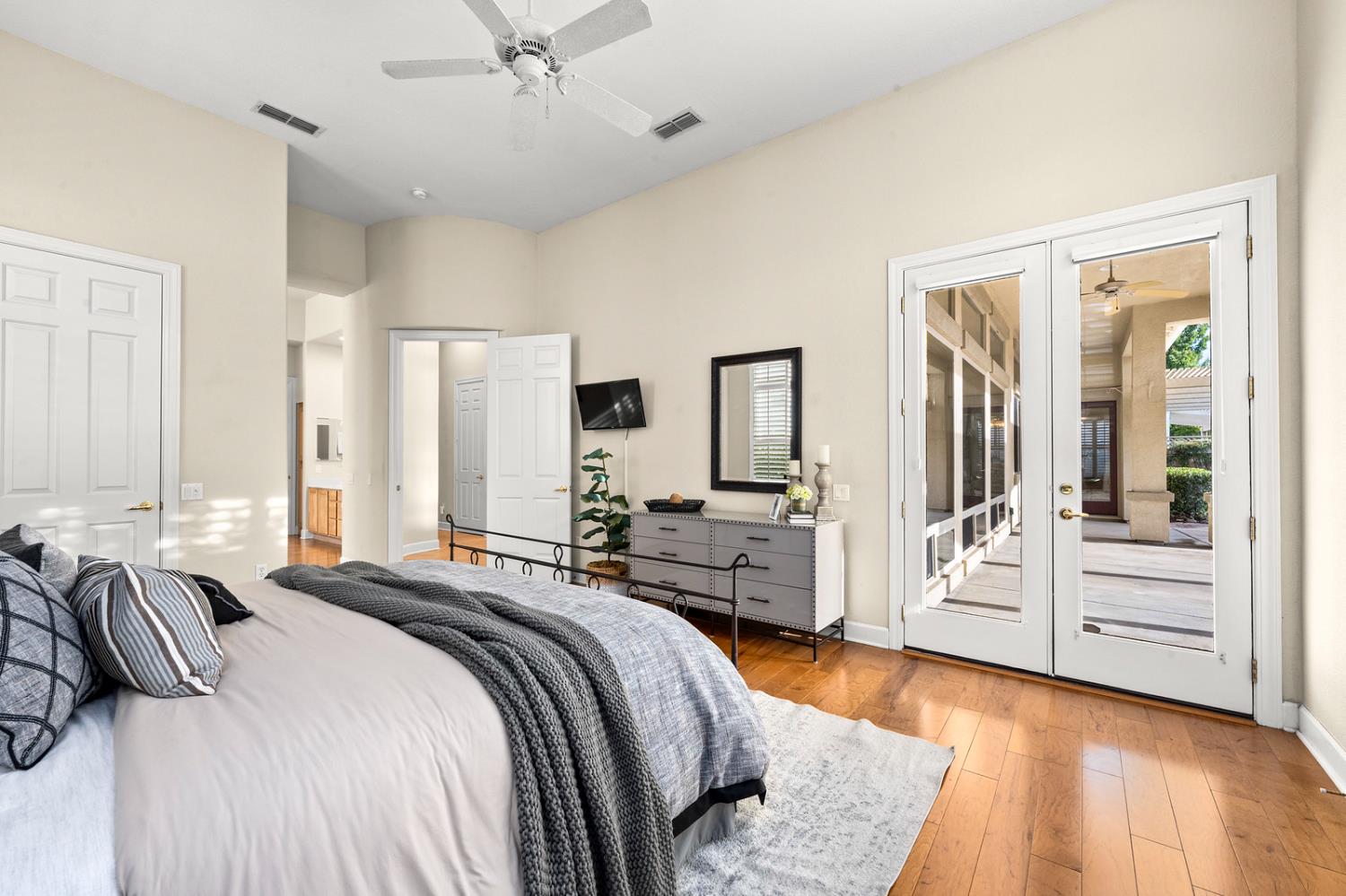 856 Mossy Ridge Lane Lincoln, CA 95648 - Photo 23 of 44 a bedroom with a bed and a large mirror