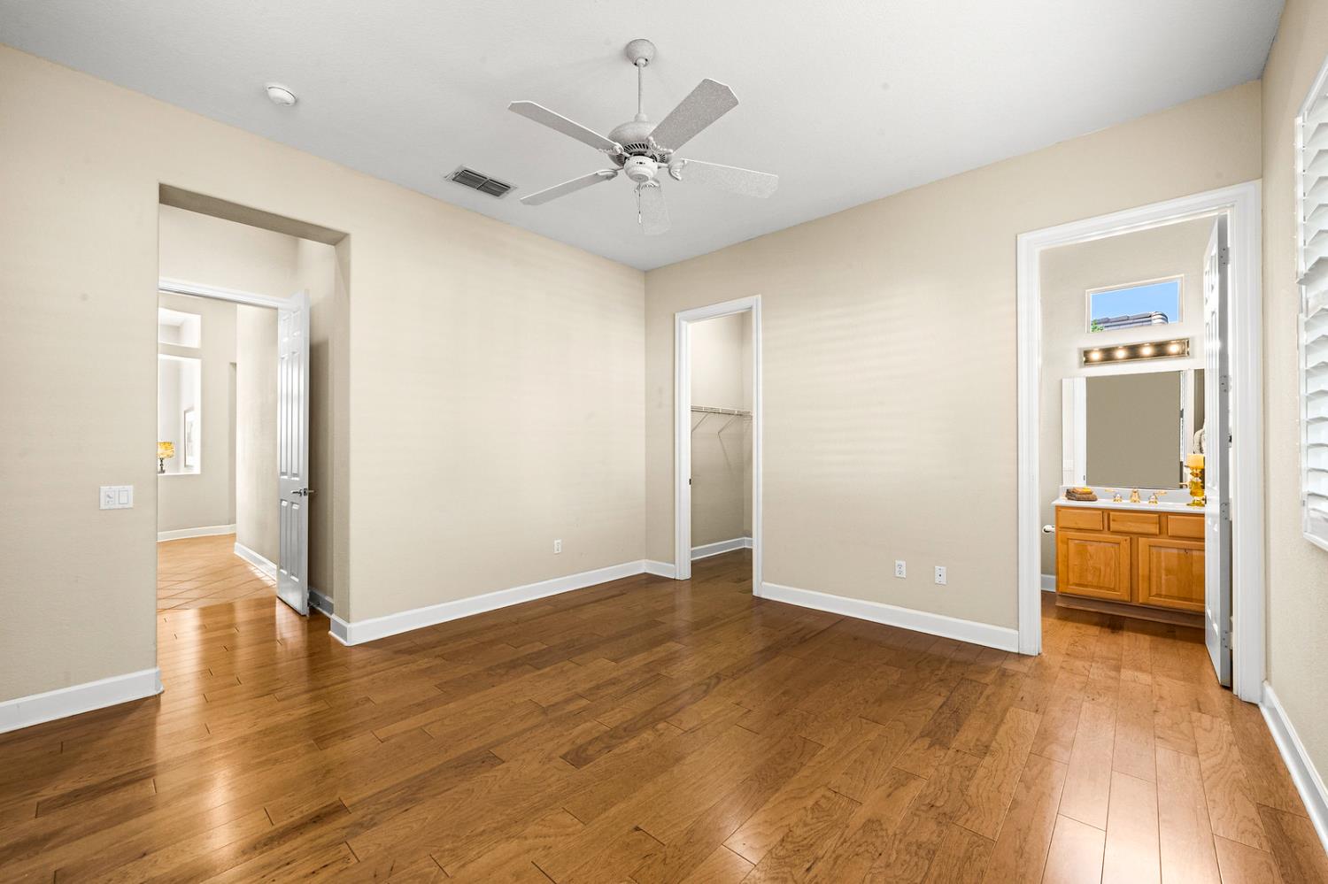 856 Mossy Ridge Lane Lincoln, CA 95648 - Photo 27 of 44 wooden floor in an empty room with a window